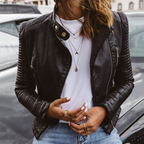Black leather moto jacket with asymmetrical zip front and quilted sleeve panels