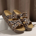 Snake print leather comfort sandals with open toe straps and stacked wedge sole