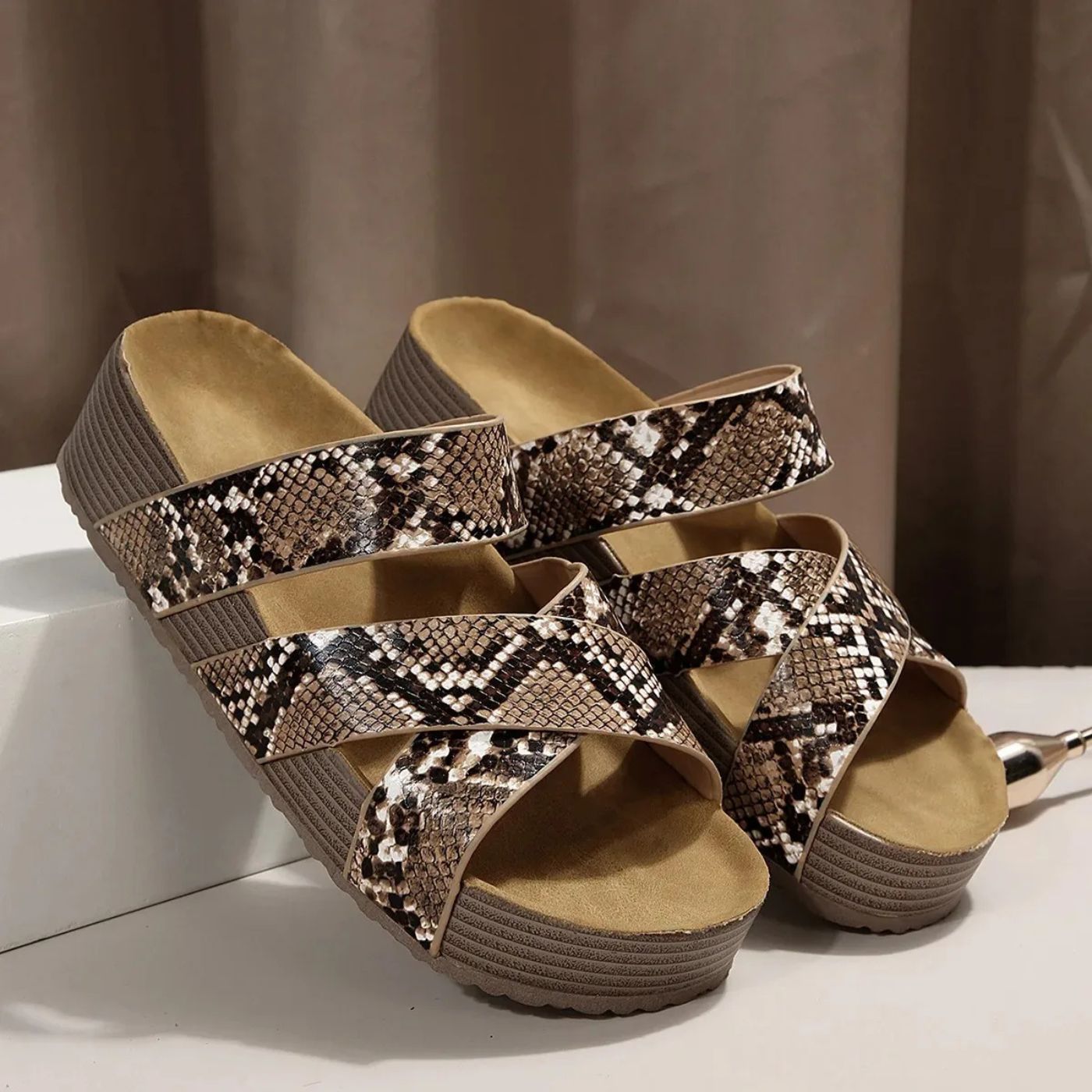 Snake print leather comfort sandals with open toe straps and stacked wedge sole