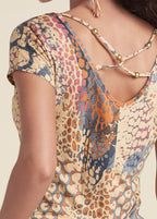 V-neck romper neckline and shoulder straps, abstract orange multi print