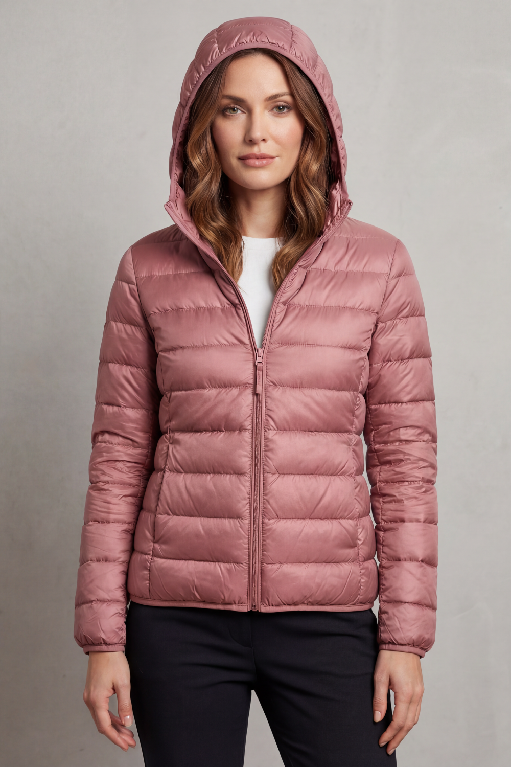 Women’s hooded puffer jacket in rose pink, full-zip front and quilted insulation.