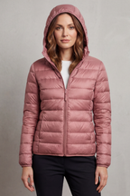 Women’s hooded puffer jacket in rose pink, full-zip front and quilted insulation.