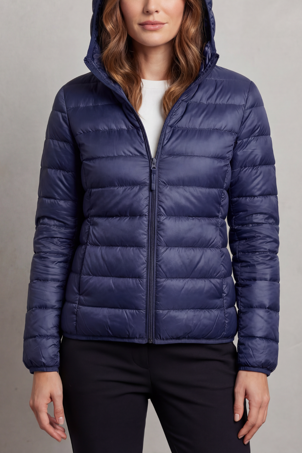 Lightweight hooded puffer jacket in dark blue, full-zip front and quilted baffles