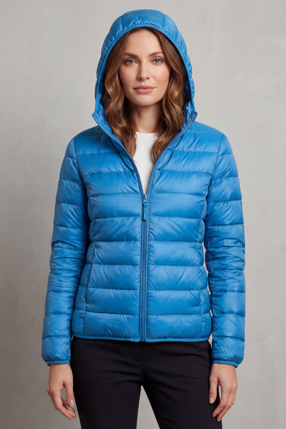 Lightweight hooded puffer jacket in bright blue, full-zip front and quilted baffles
