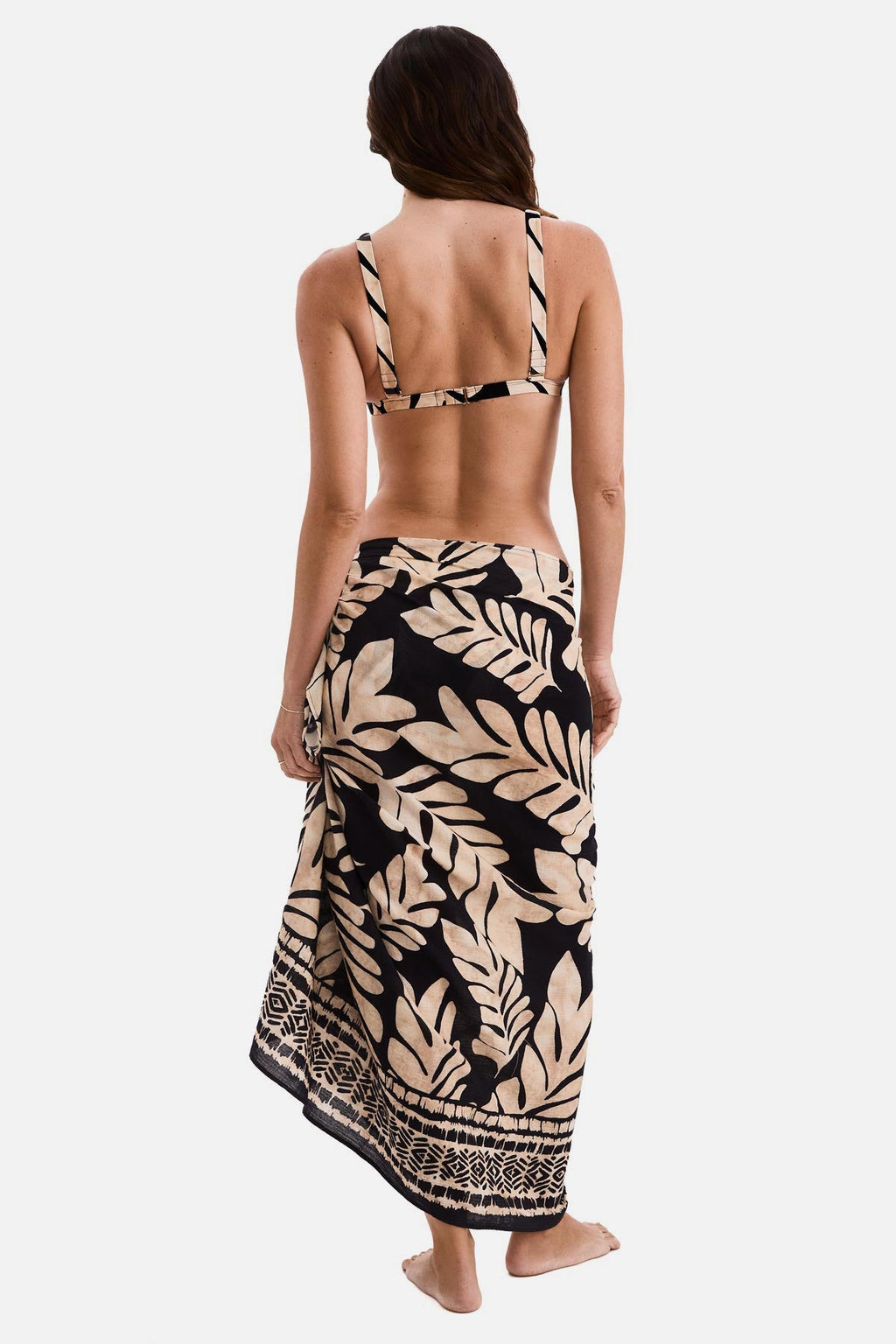 Back-view leaf-print pareo skirt with tie straps, black and beige, tassel hem