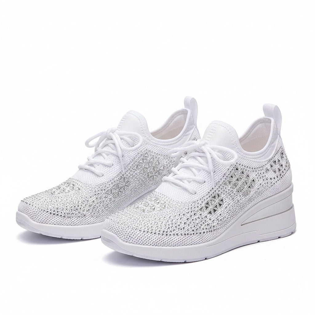 White knit orthopedic sneakers with lace-up front and thick white cushioned sole