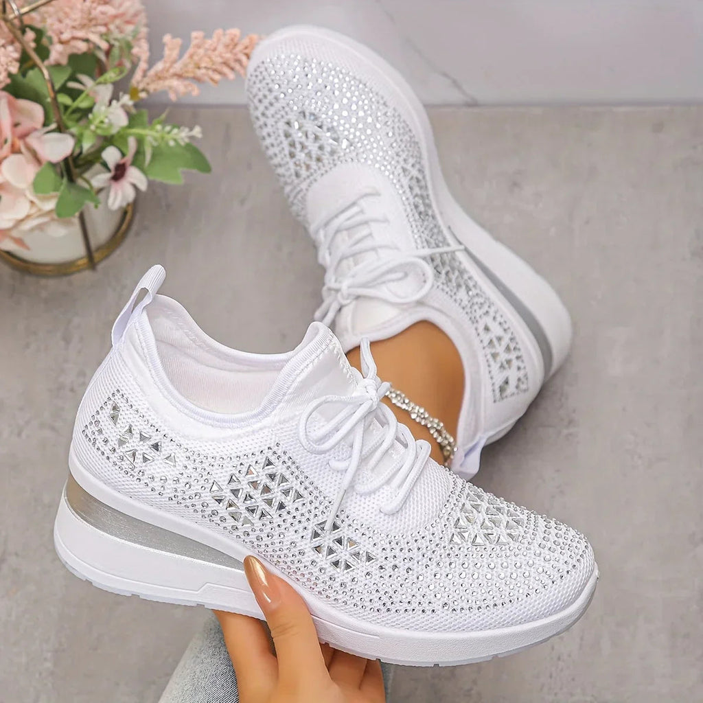 White knit orthopedic sneakers, lace-up front and chunky sole in angled view