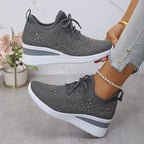 Gray knit orthopedic sneakers with lace-up front and chunky white midsole