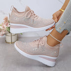 Light pink knit orthopedic sneakers with lace-up front and white cushioned sole