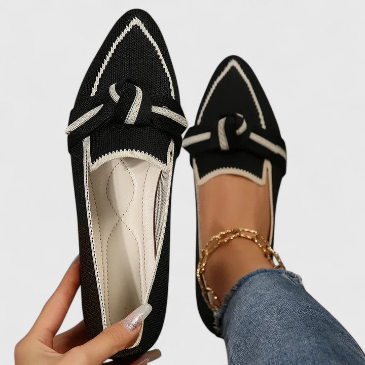 Women’s ribbon comfort sandals in black with cream trim, lace-up ribbon bow detail.