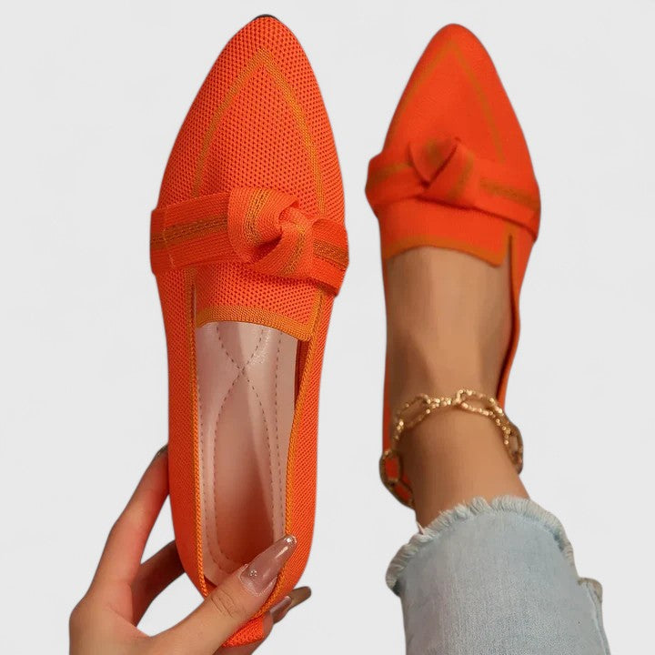 Women’s ribbon comfort sandals in orange with gold-tone chain strap detail.