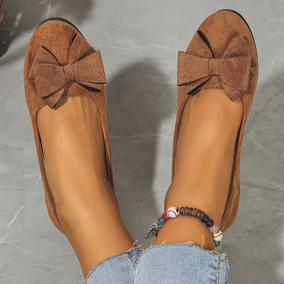 Brown suede ballerina flats with bow detail