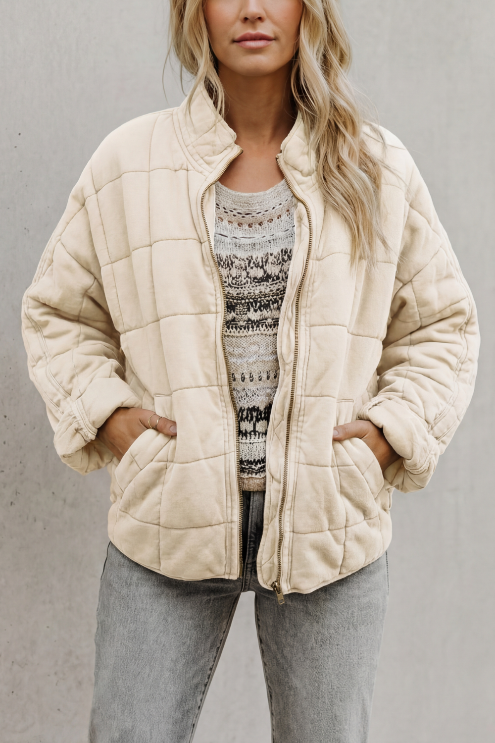 Quilted women’s zip-up jacket in cream, stand collar, long sleeves, front pockets