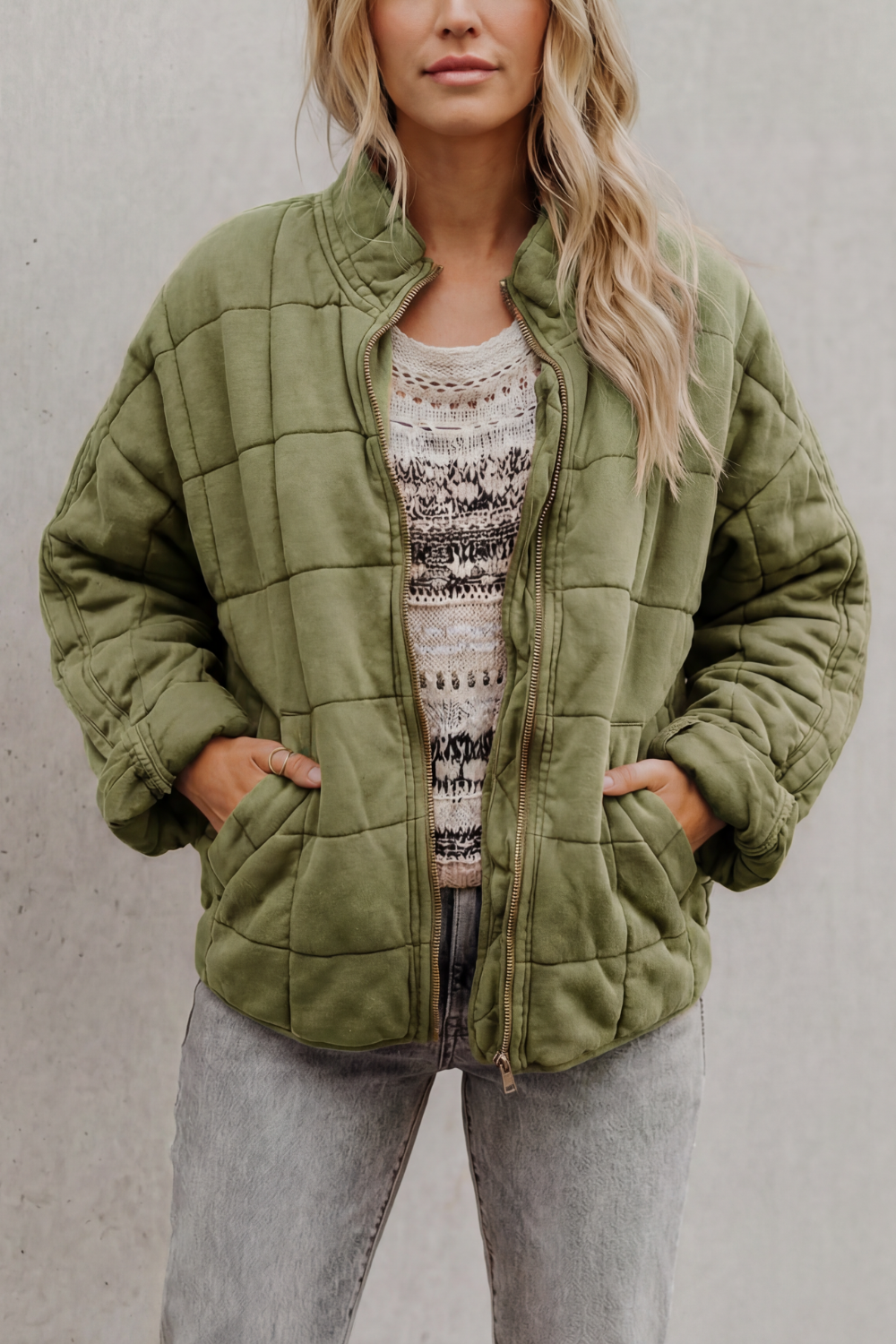 Quilted women’s zip-up jacket in sage green, stand collar, long sleeves, front pockets