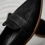 Aurelia black suede loafers, strap across vamp and textured finish