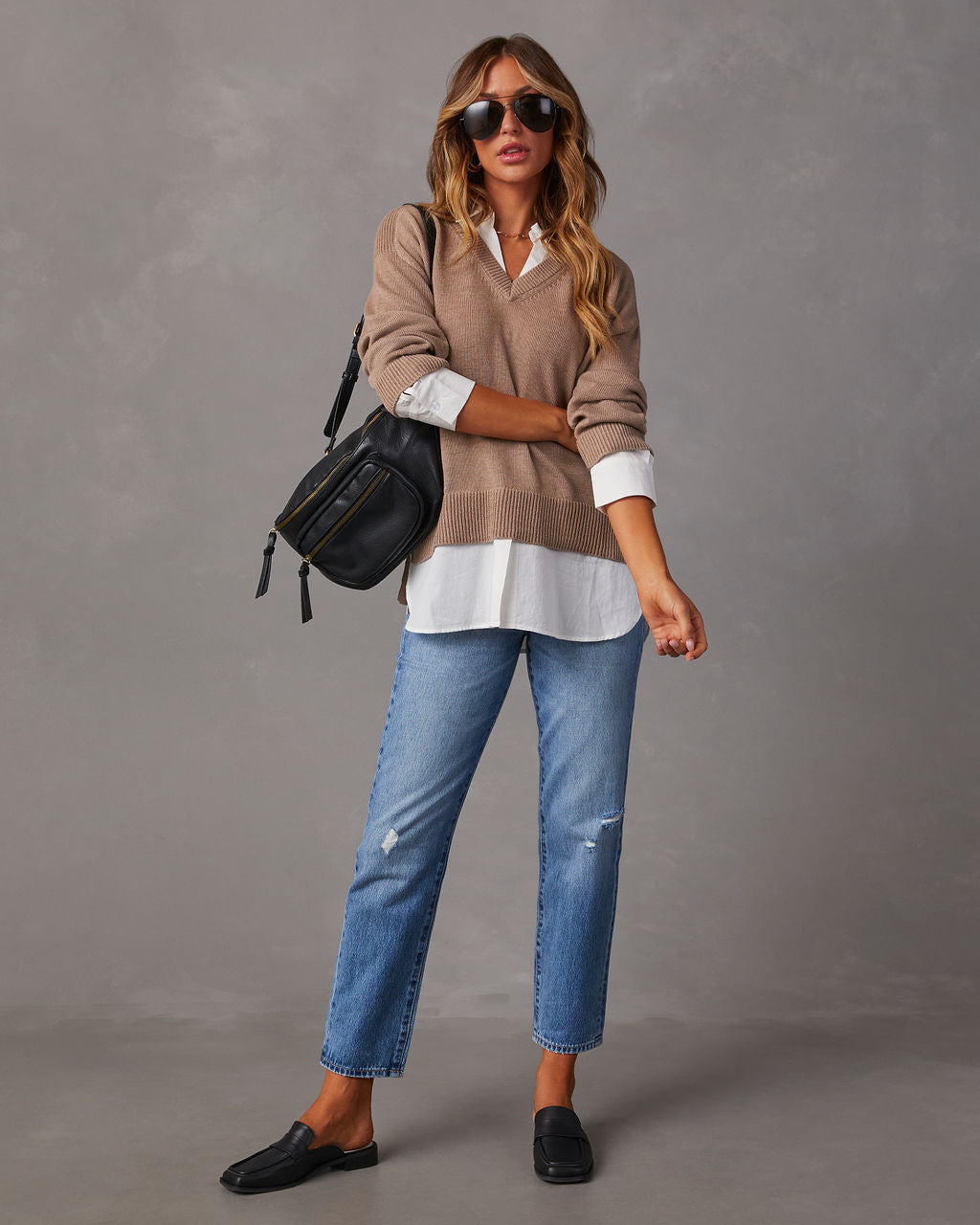 Camel V-neck pullover sweater with white contrast shirt hem; long sleeves