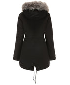Women’s parka coat in black with faux fur trimmed hood and adjustable drawcord hem