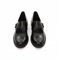 Women's black leather loafers with buckle strap, closed toe and low profile sole.