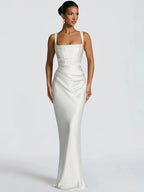 White satin halter maxi dress with square neckline, fitted column silhouette