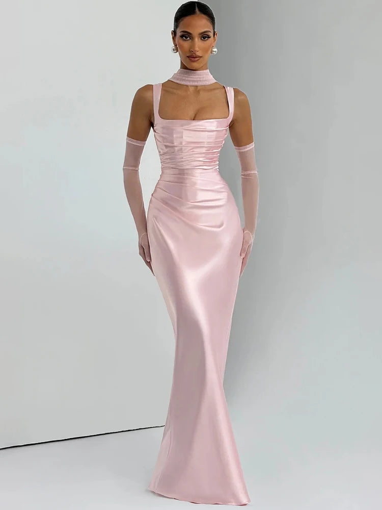 Pink satin halter maxi dress with square neckline, fitted waist and long column skirt