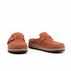 Brown slip-on loafers with buckle strap and stitched moc toe