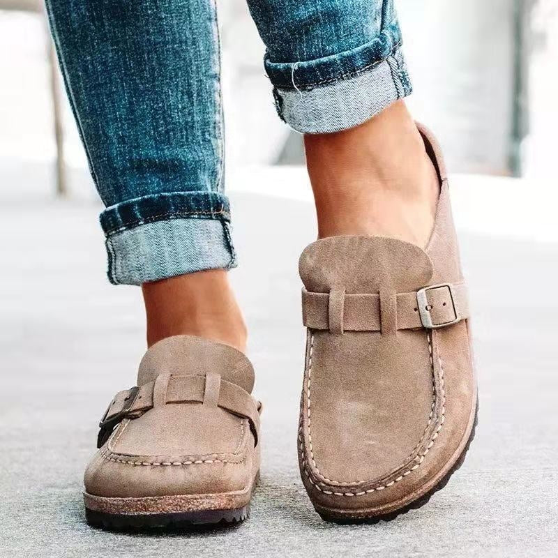 Beige slip-on loafers with buckle strap and stitched moc toe