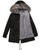 Women’s parka coat in black with sherpa-lined interior and faux fur trim hood