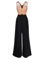 Black wide-leg jumpsuit with polka-dot V yoke and waist belt