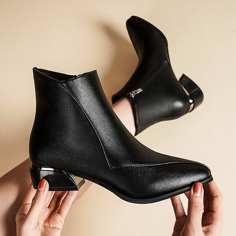 Black ankle boots with side zipper and block heel, smooth finish