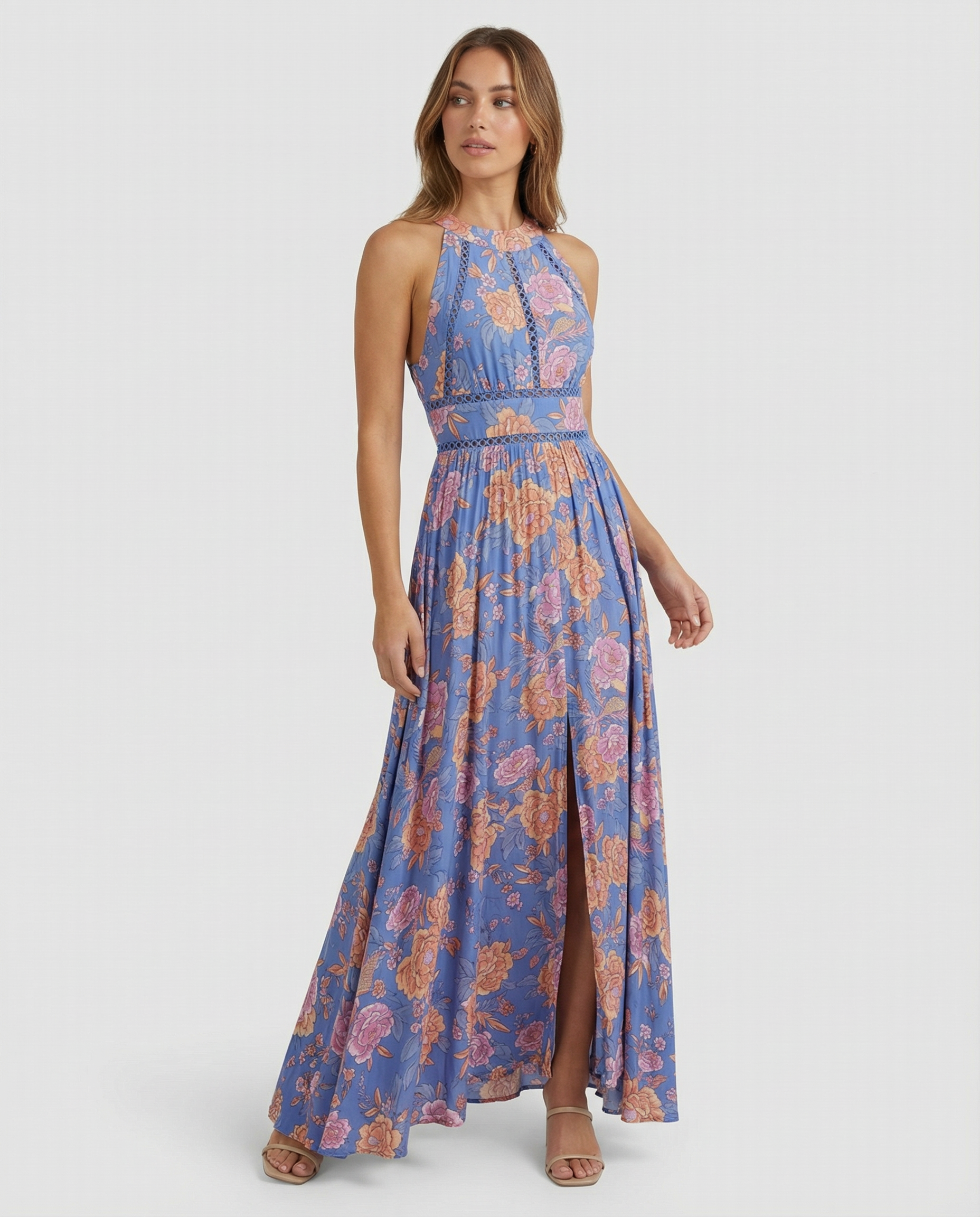 Blue sleeveless floral maxi dress with high neckline and tiered skirt