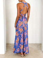 Blue sleeveless floral maxi dress with crisscross back straps and open back