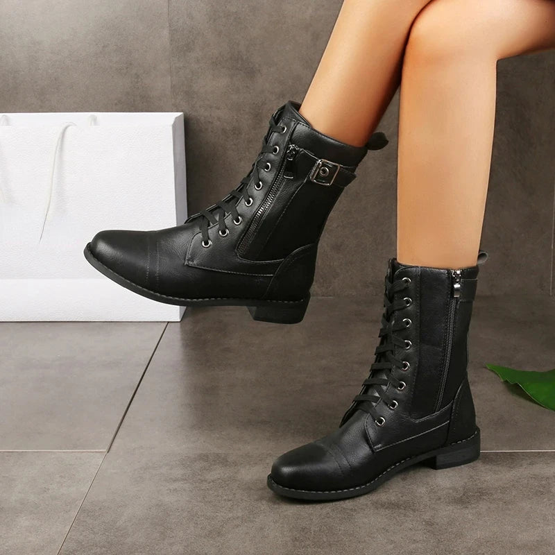 Black leather lace-up tall boots with side buckle strap and low block heel