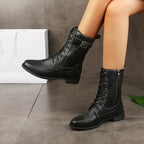 Black leather lace-up tall boots with side buckle strap and low block heel