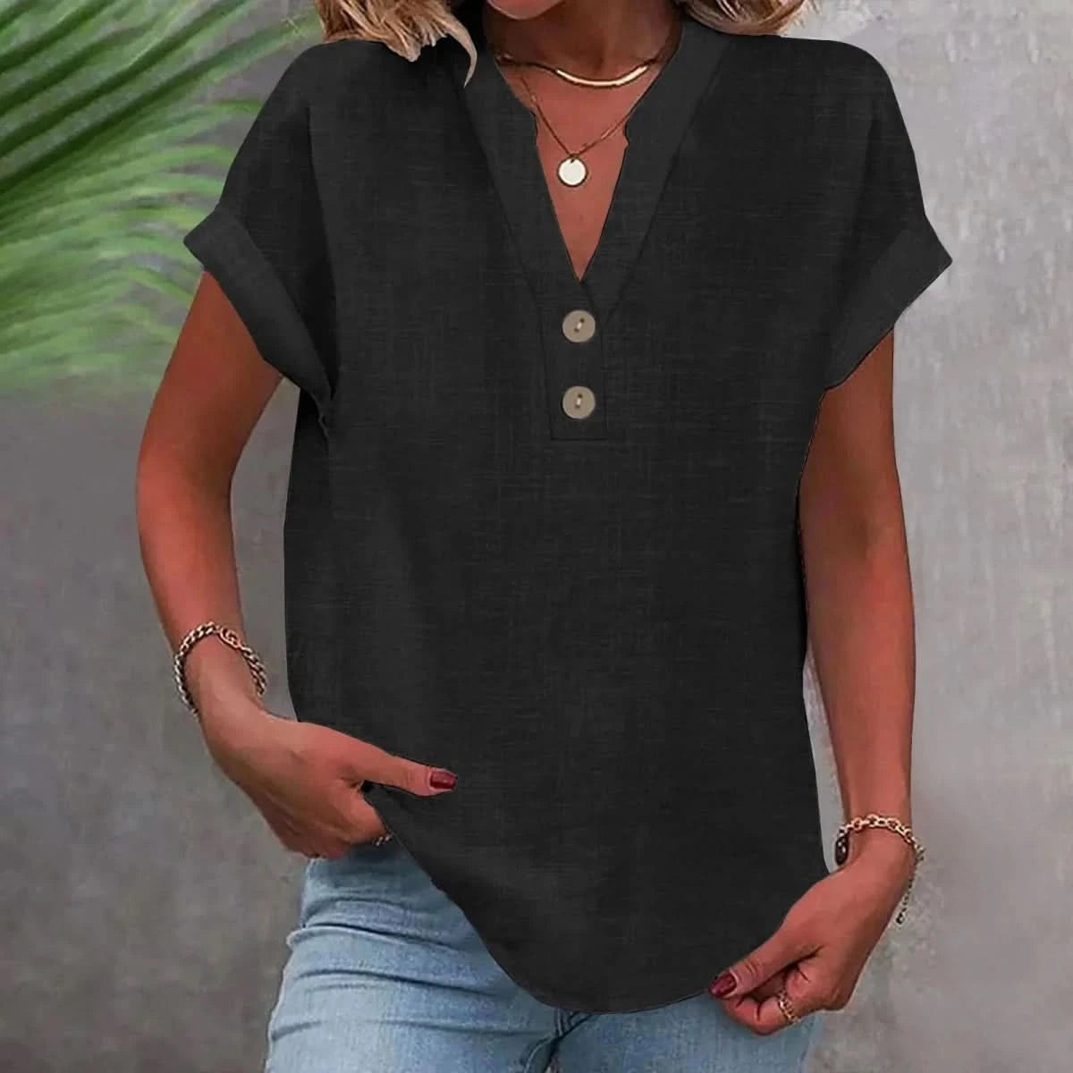 Breathable linen V-neck top in black with short sleeves and button-front placket