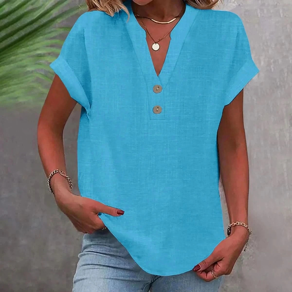 Breathable linen V-neck top in turquoise blue with short sleeves and button-front placket