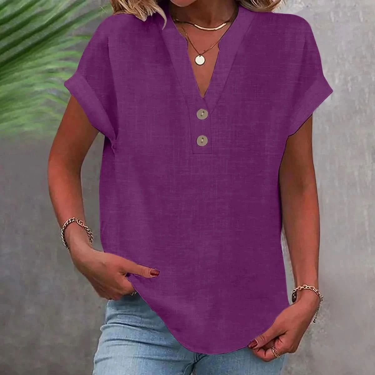 Purple linen V-neck top with short sleeves and button-front placket