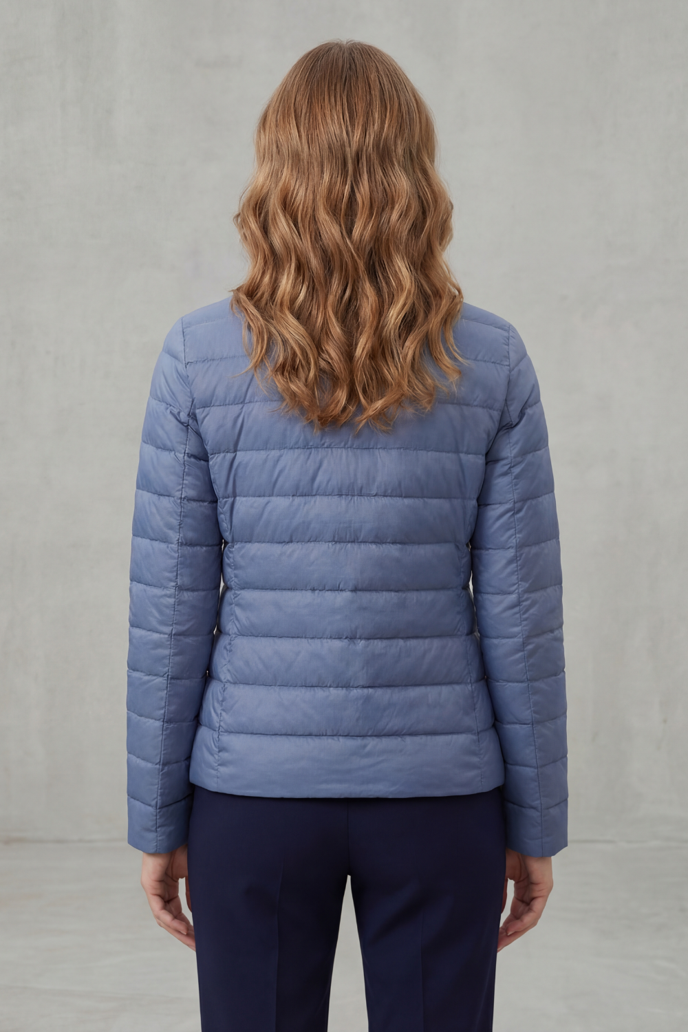 Women’s lightweight quilted puffer jacket, blue, back view with horizontal quilting