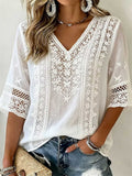 White floral embroidered lace cutwork blouse with V-neck and 3/4 sleeves