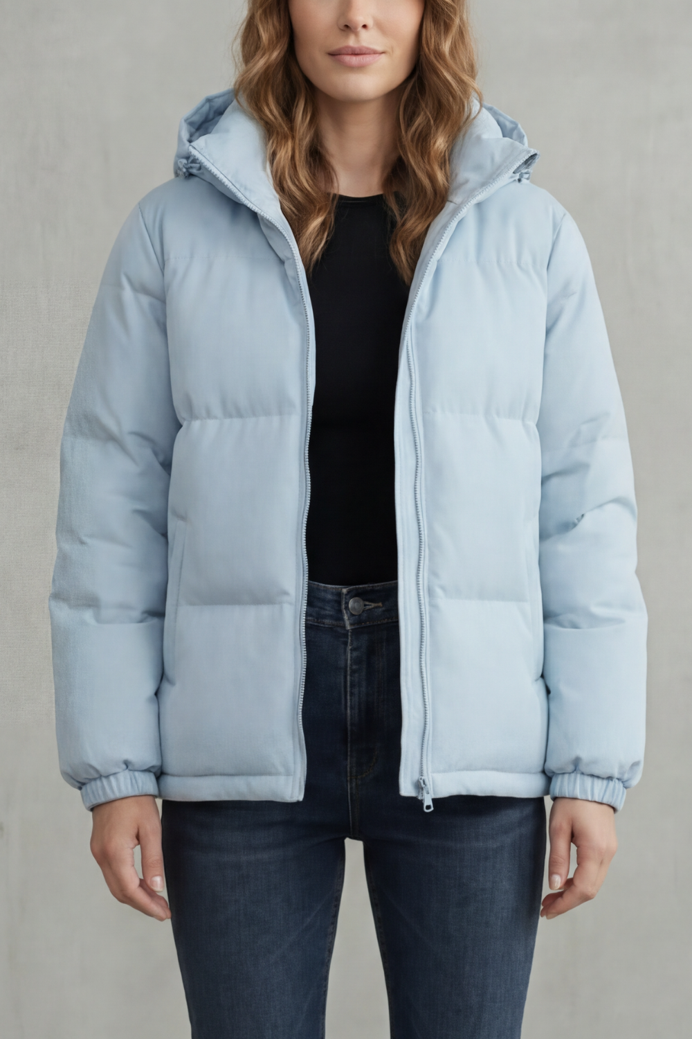 Light blue hooded puffer jacket with full zip front and ribbed sleeve cuffs
