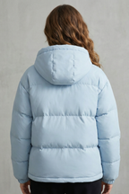 Light blue quilted hooded puffer jacket, back view with stitched paneling