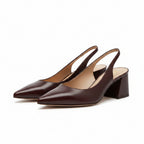 Brown leather pointed-toe slingback heels with low block heel and side strap.