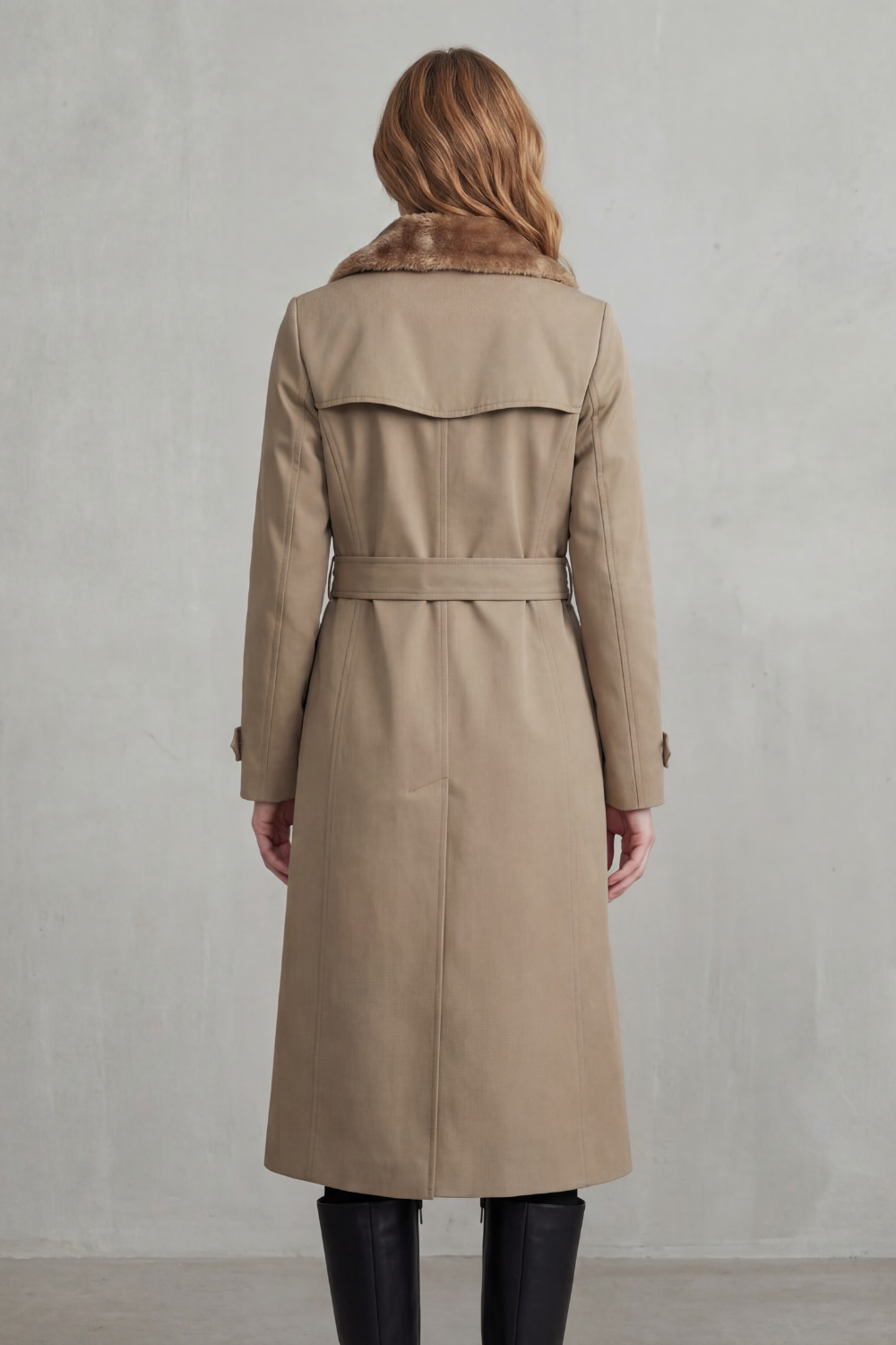 Back view of khaki faux fur-lined trench coat with belt at waist