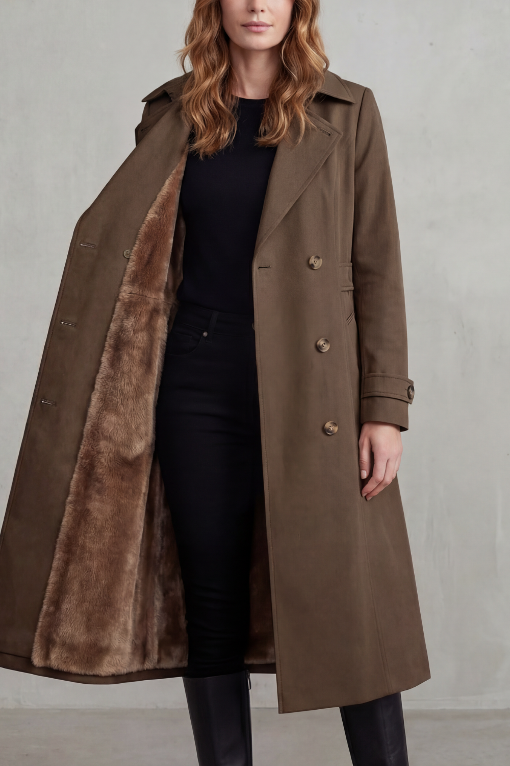 Brown faux-fur-lined double-breasted trench coat with brass-tone buttons and wide lapels.