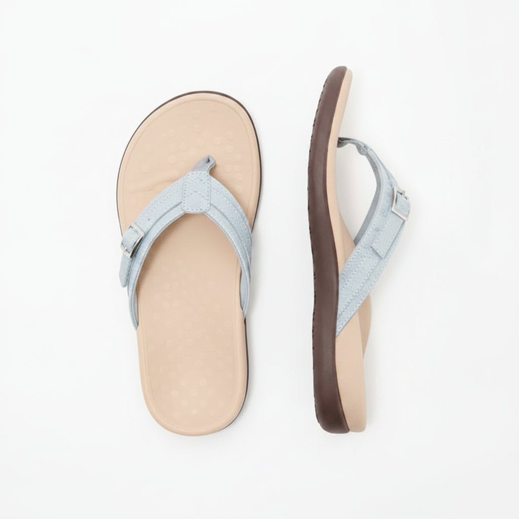 Light blue womens flip-flop sandals with thong strap and dark brown sole