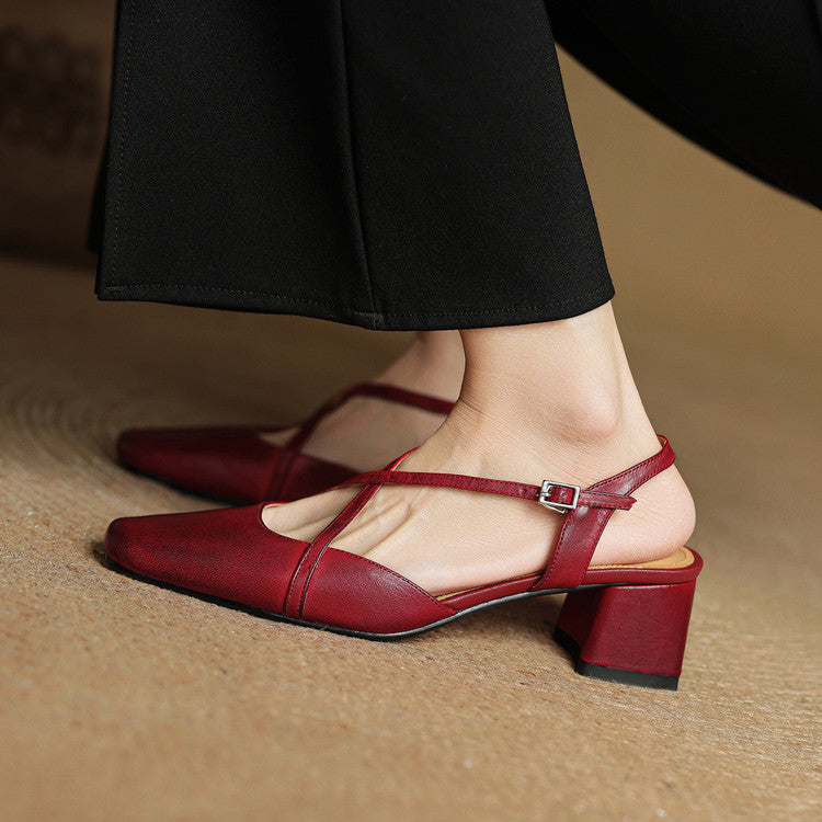 Red pointed-toe heeled sandal with slingback strap and square buckle