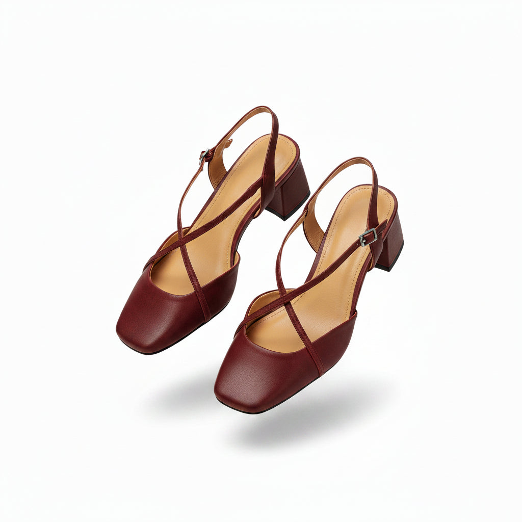 Red open-toe heeled sandals with ankle strap, block heel, and slingback detail