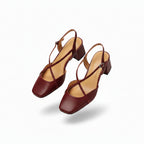 Red open-toe heeled sandals with ankle strap, block heel, and slingback detail