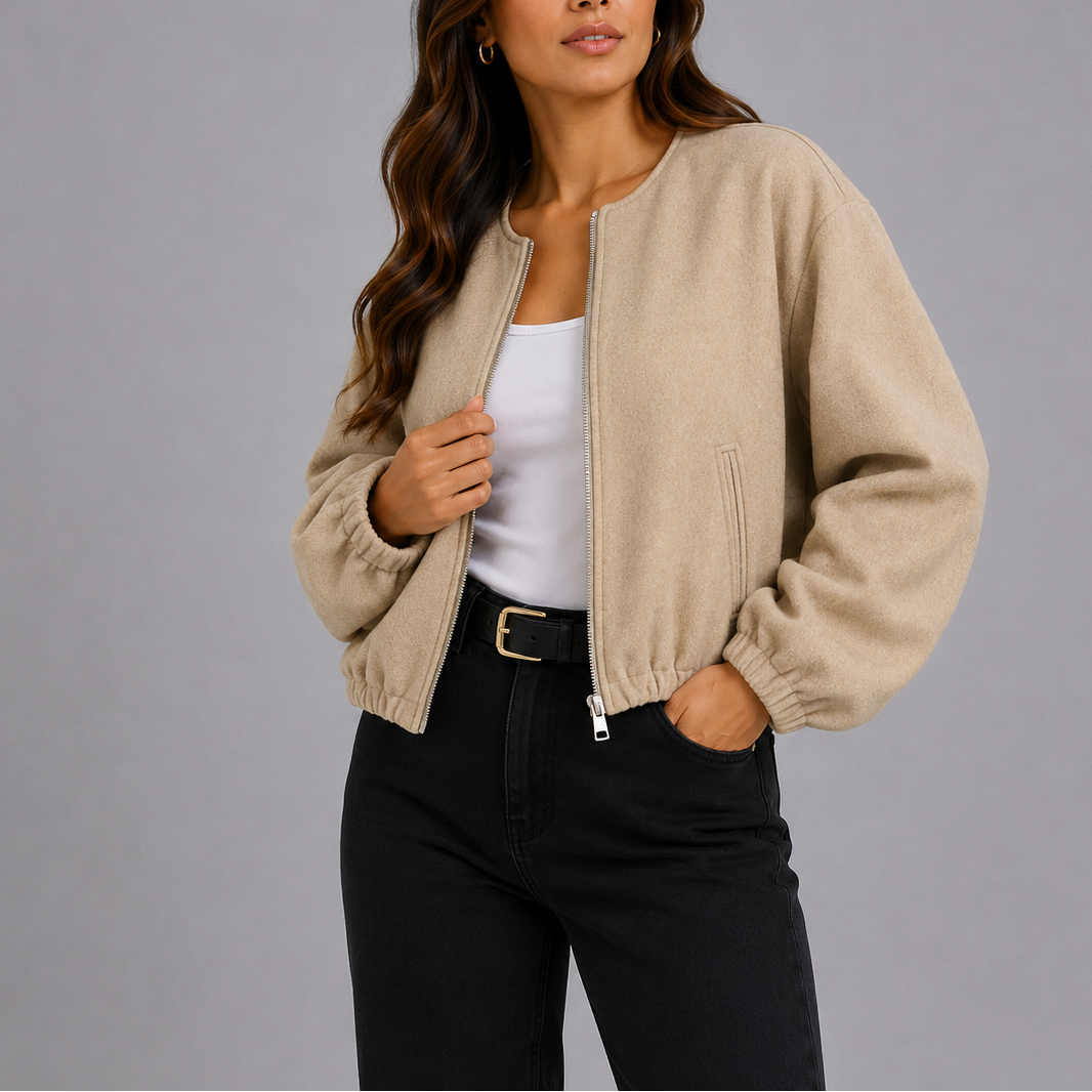 Women’s lightweight beige bomber jacket with front zipper and side pockets