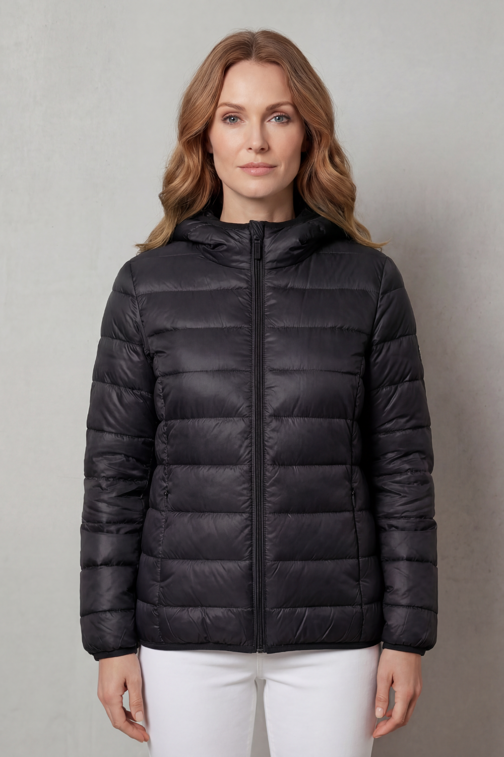 Black hooded puffer jacket with lightweight quilted finish and full-zip front