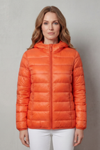 Orange hooded puffer jacket with lightweight quilting and full-zip front